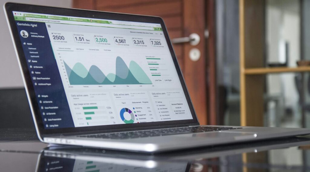 Financial statistics displayed on a laptop