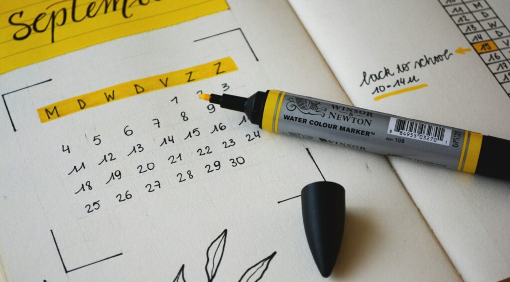 Planner notebook with dates marked