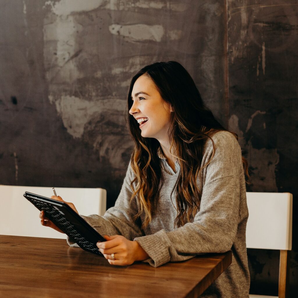 Business owner reviewing finances on a tablet
