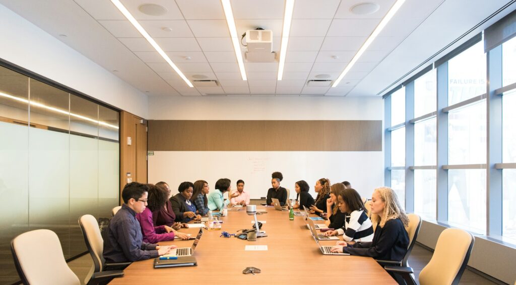 People having a business meeting at a boardroom table