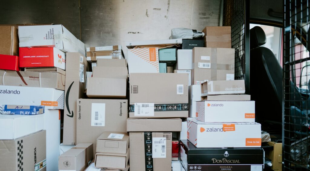 Stack of shipping boxes inside a delivery van