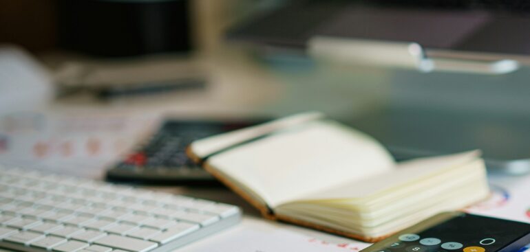 Financial report with charts on an office desk