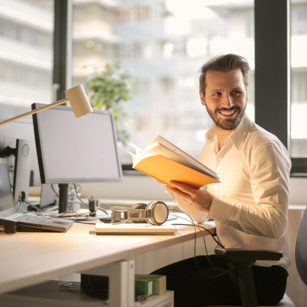 Business owner reviewing tax deadlines on a laptop
