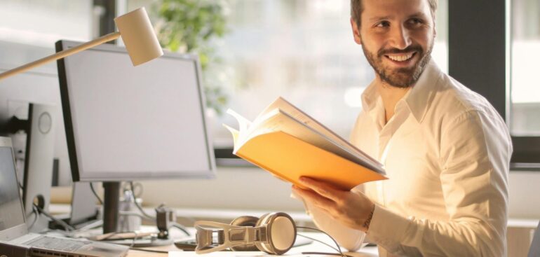 Business owner reviewing tax deadlines on a laptop