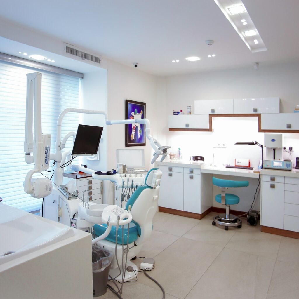 Modern dental office with treatment chair and equipment