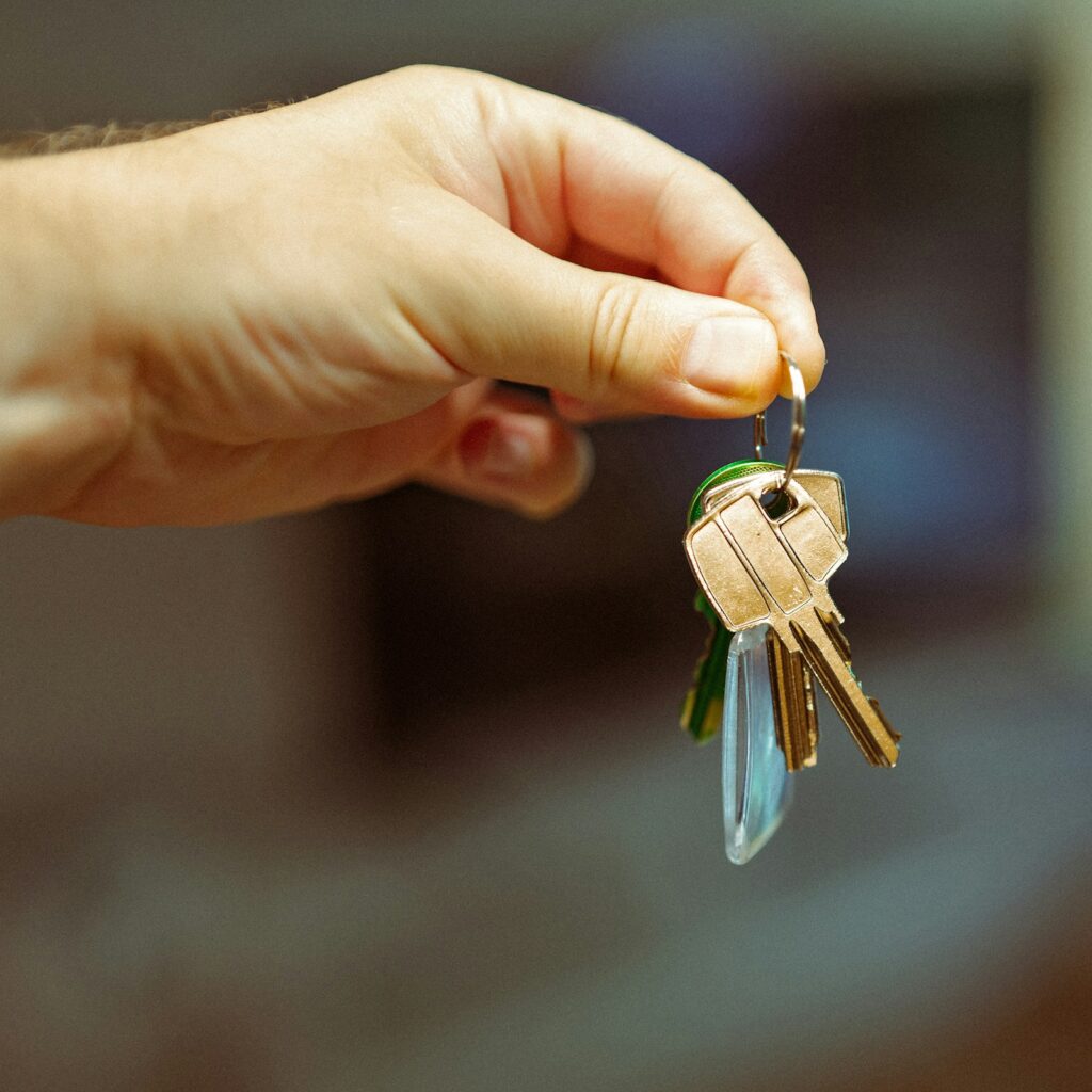 Landlord holding the keys to a rental property