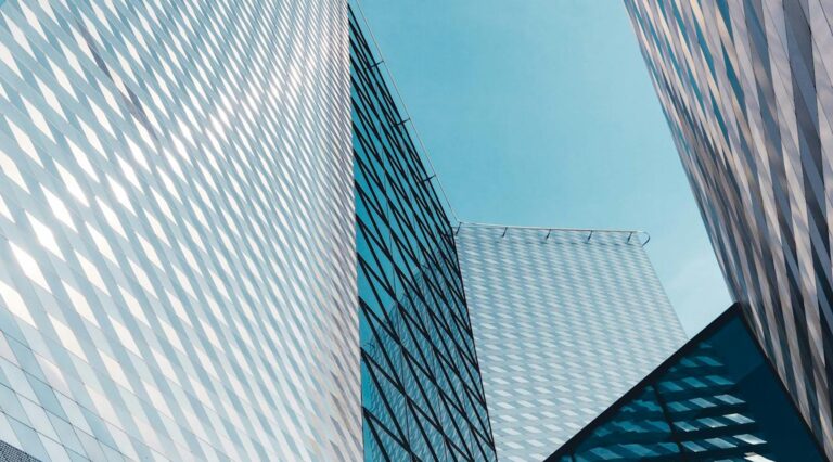 Blue glass office building, abstract background